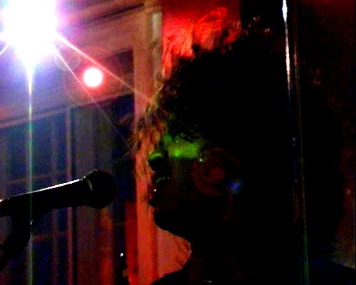 Silhouette at the mic, Vibe Bar, London, 2005