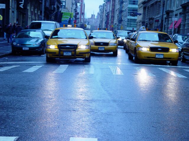Yellow cabs in the rain, New York, 2005
