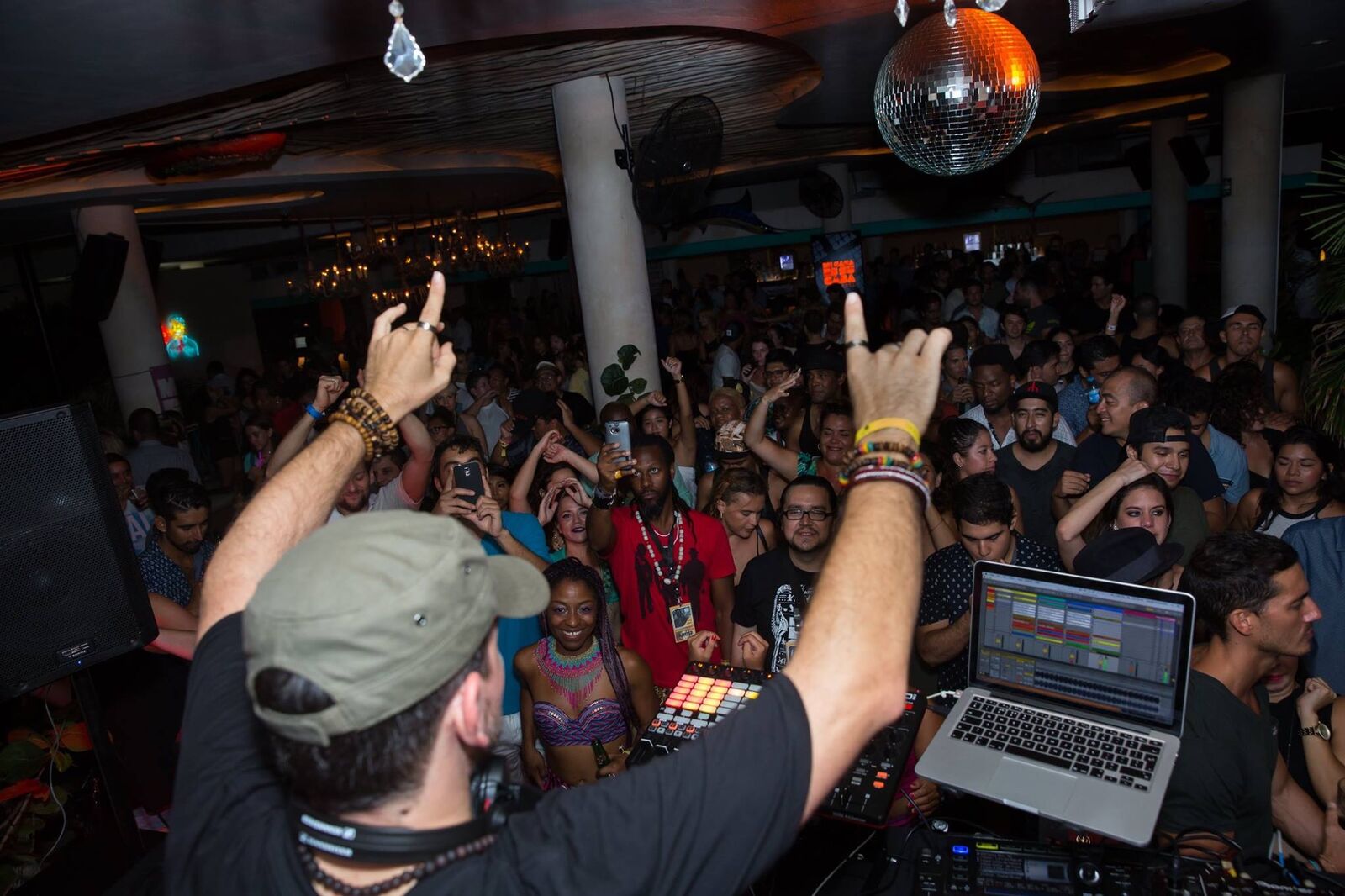 Hands in the air at a festival DJ set, 2016