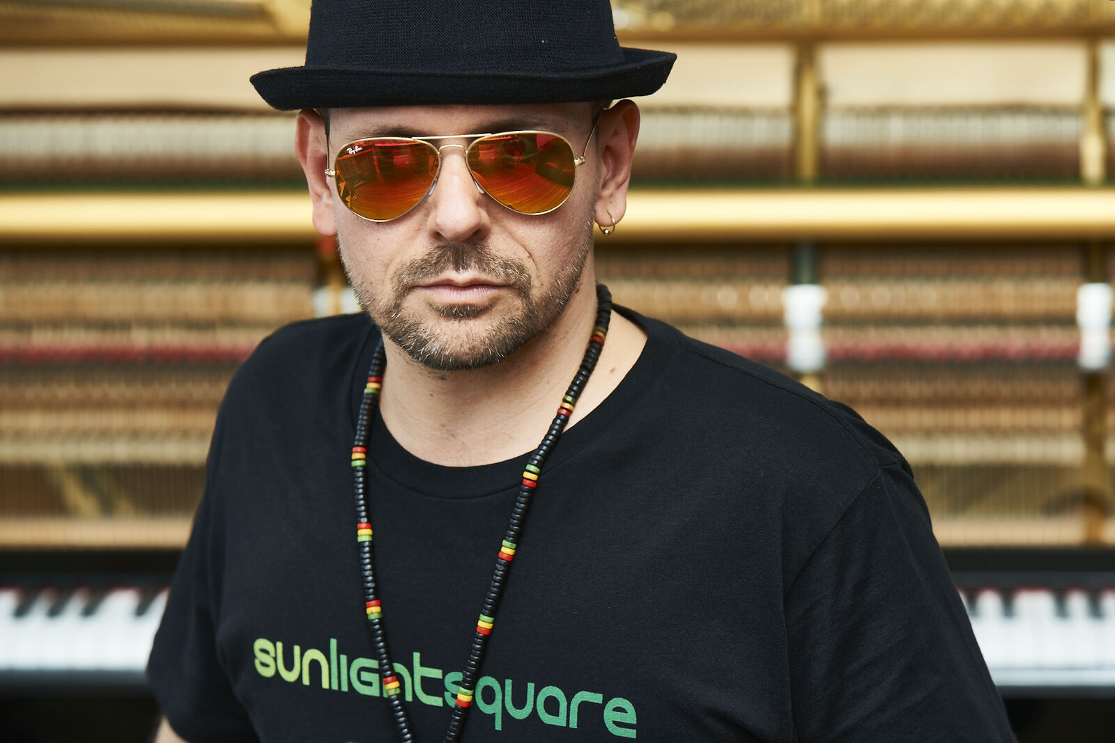 Sunlightsquare tee and an open piano, 2017
