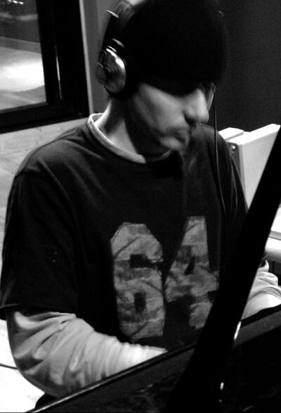 At the piano in the Urban Sessions era (mid-2000s, B&W)