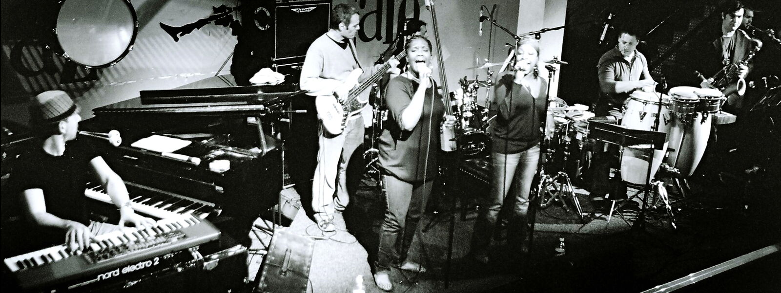 Sunlightsquare live on stage, B&W panoramic (2009)